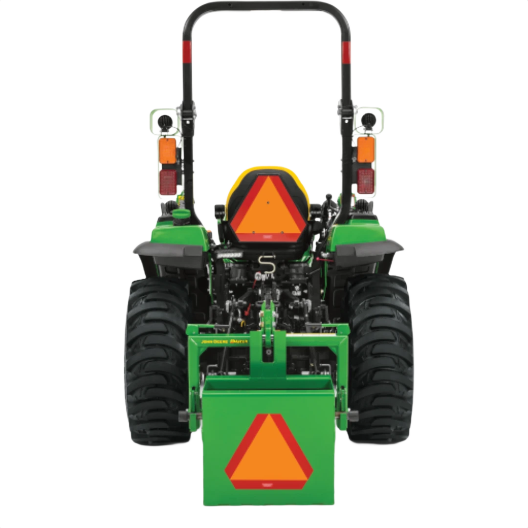 Rear view of a green and yellow John Deere 2038R sub-compact tractor with rugged tires and safety reflectors, featured in Outdoor Power Equipment at Hartville Hardware.