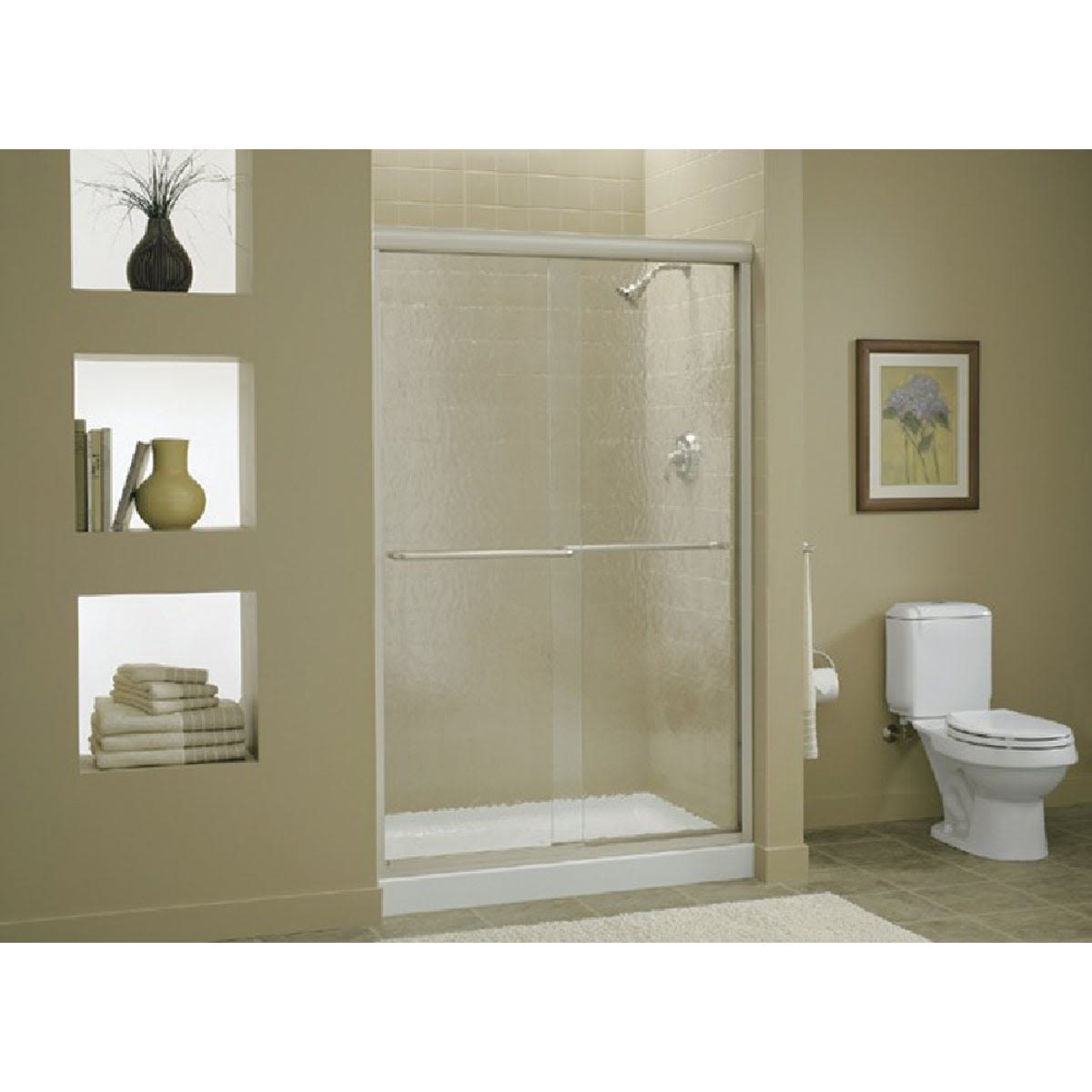 Frameless sliding shower door with clear glass and polished metal frame in modern bathroom setting for home improvement