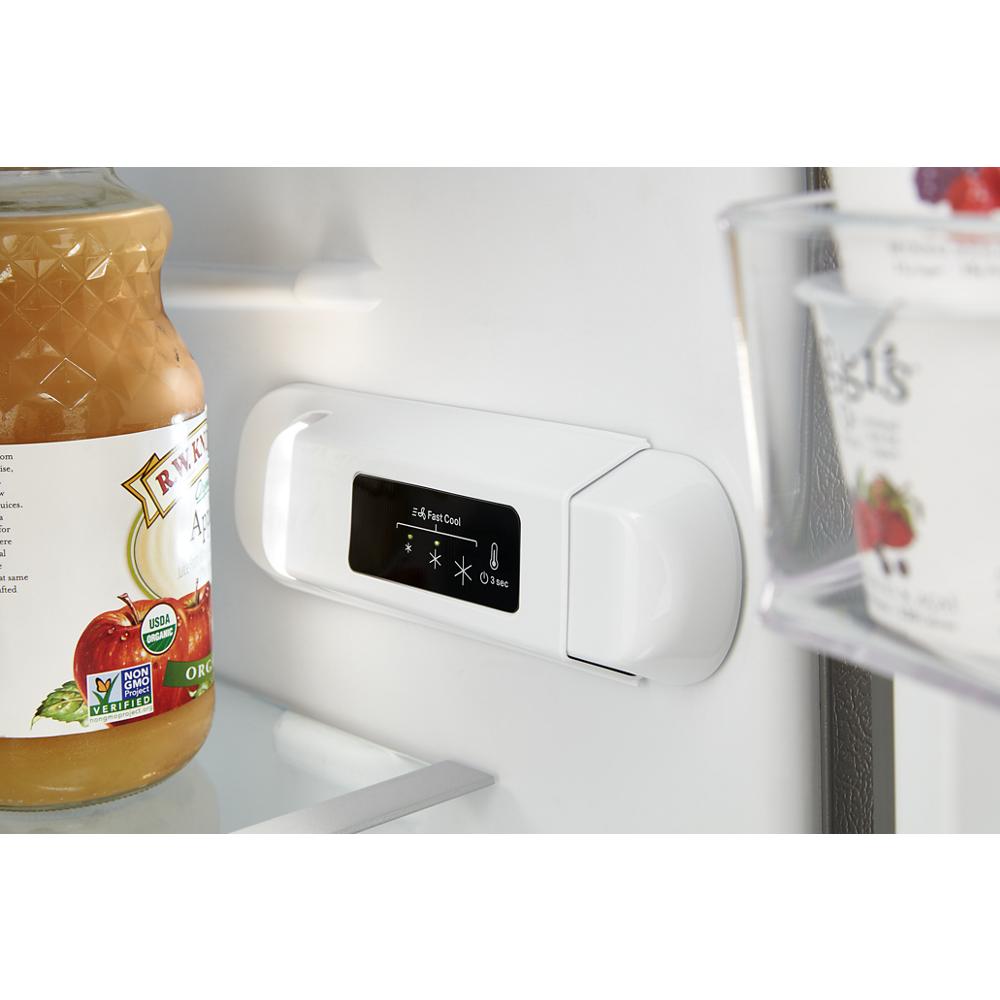 Close-up of digital temperature control panel inside top-freezer refrigerator in kitchen appliances collection