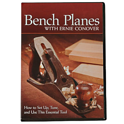Instructional DVD cover showing a vintage bench plane woodworking tool on wood shavings and board background