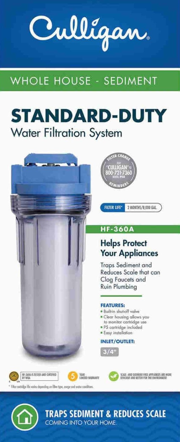 Blue top water filtration system housing with clear body for sediment trapping and scale reduction in home water protection