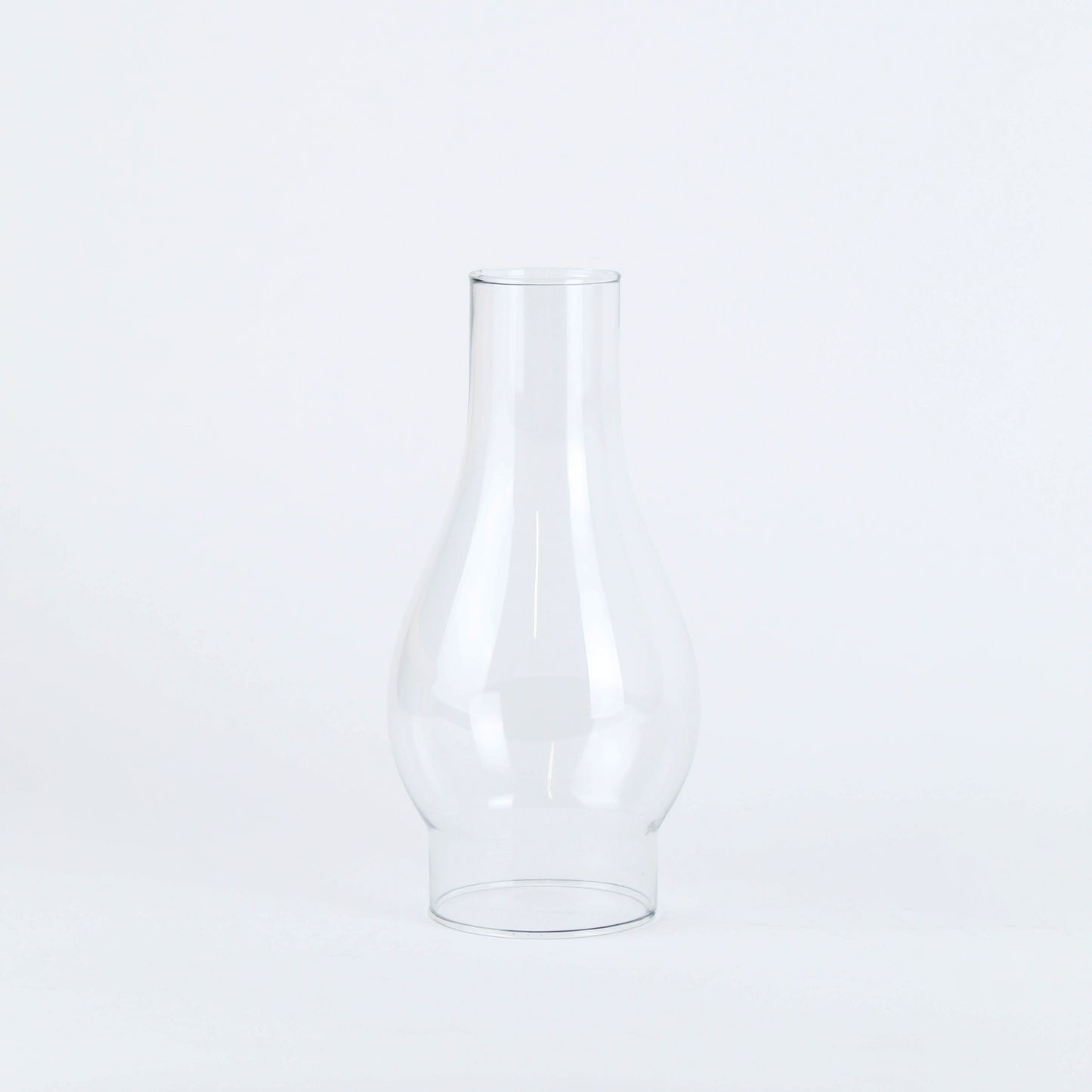 Clear Westinghouse glass lamp chimney with classic curved design for flame protection and enhanced light diffusion in home improvement