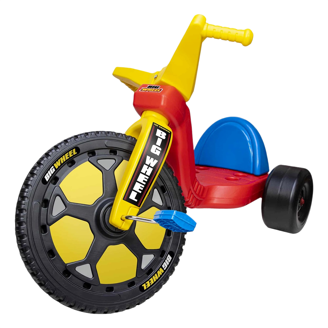 Red and yellow Big Wheel Speedster tricycle with large black and yellow front wheel and blue seat for outdoor play