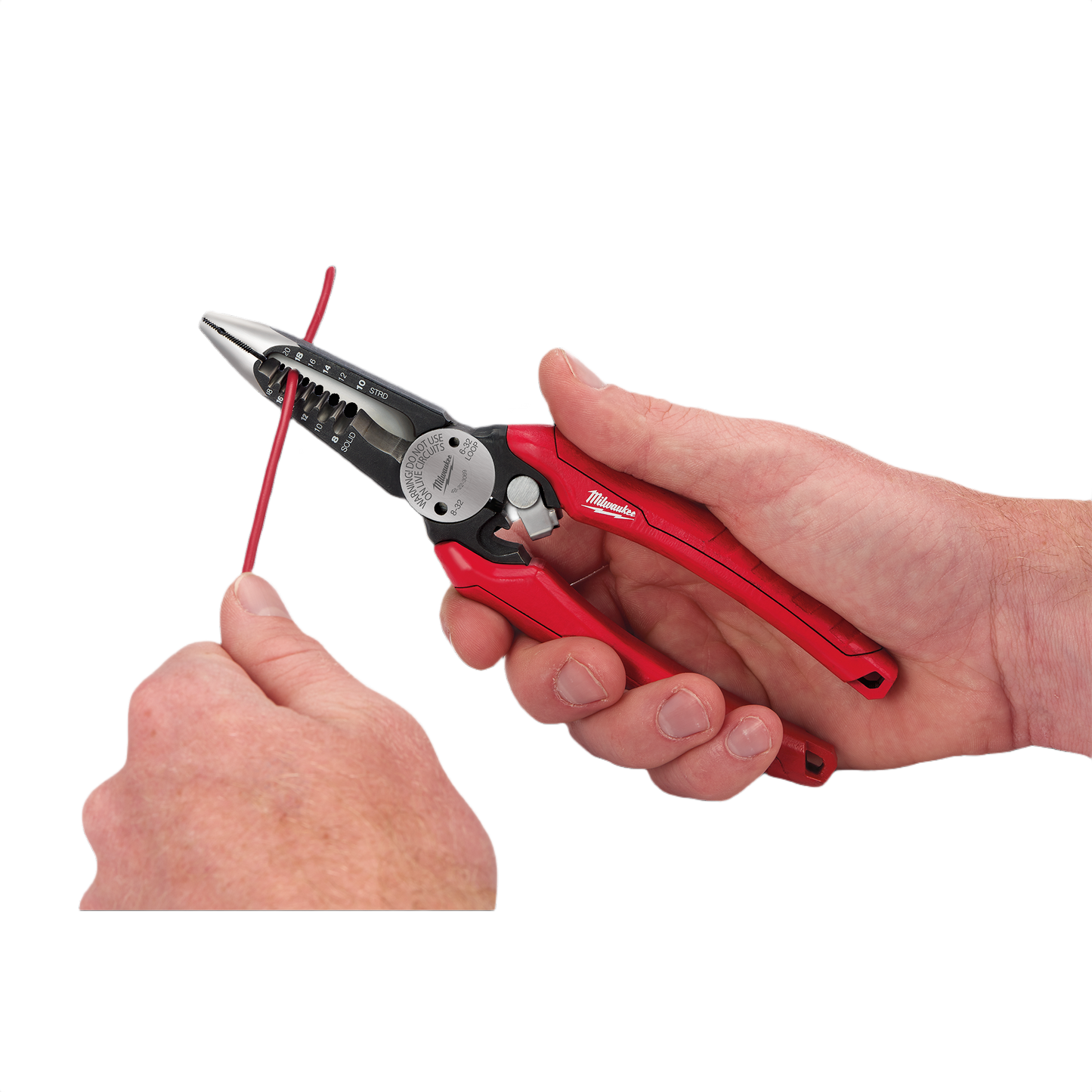 Hand using red comfort grip 6-in-1 combination pliers to strip insulation from red electrical wire for home improvement