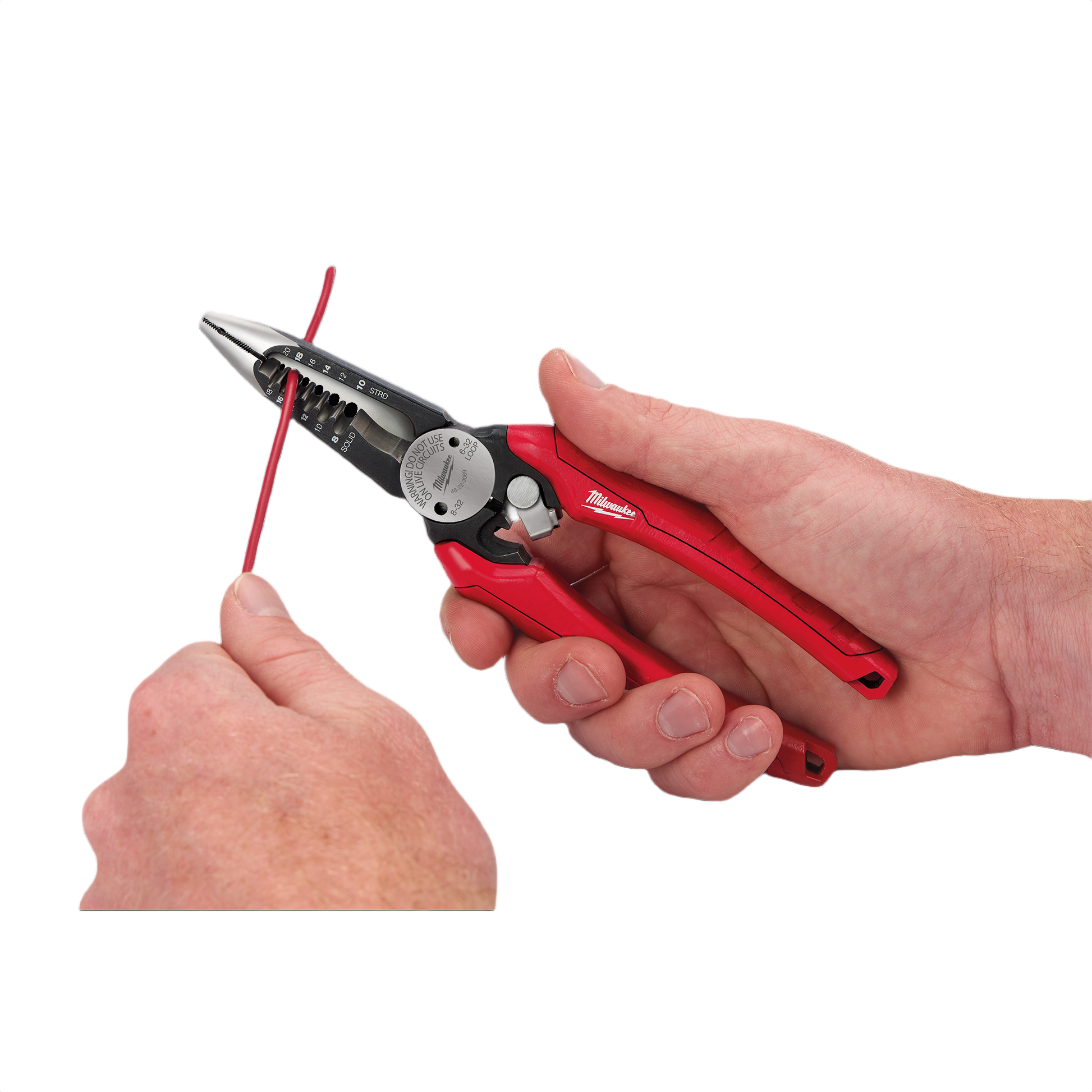 Hand using red comfort grip 6-in-1 combination pliers to strip insulation from red electrical wire for home improvement