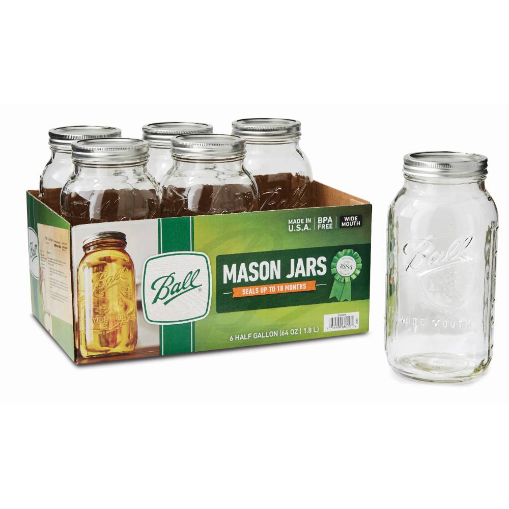 Set of six half-gallon wide mouth glass canning jars with metal lids for home storage and preservation tasks
