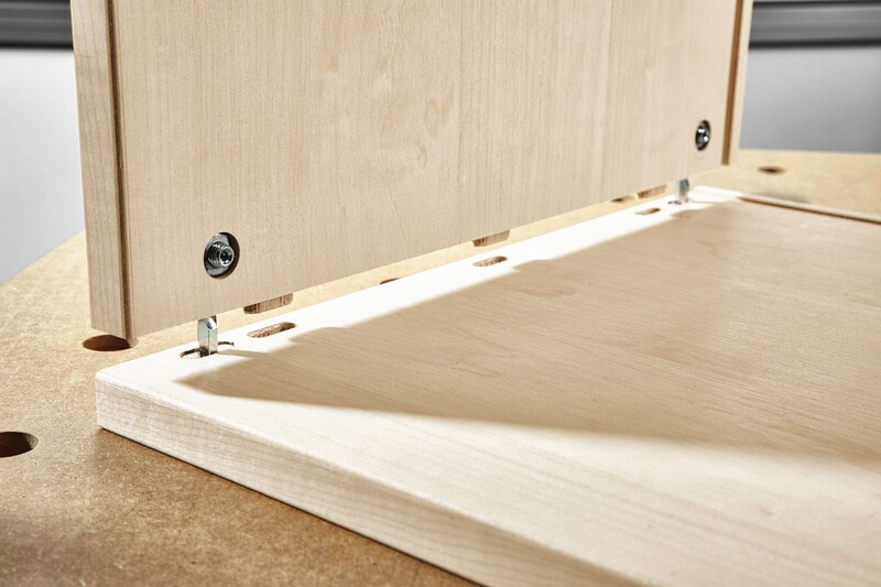 Wooden panels joined by metal connectors for stable knock-down joinery in woodworking tool accessories and home improvement