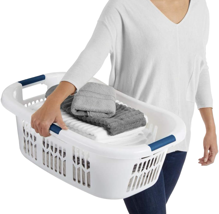 White laundry basket with three blue grip handles and ventilated sides holding folded towels for laundry use