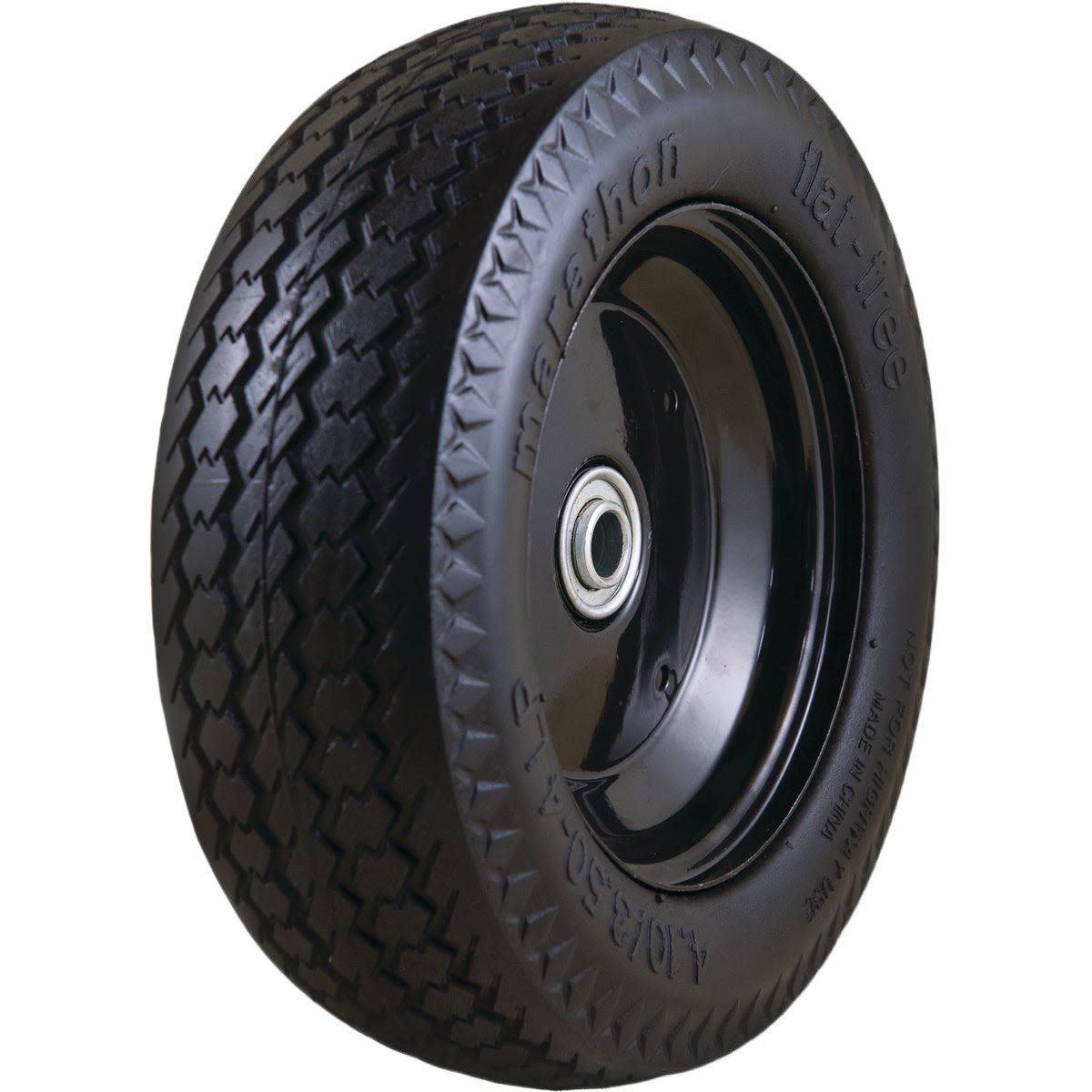 Solid black flat-free tire with metal hub and patterned tread for hand trucks and small equipment in home improvement collections