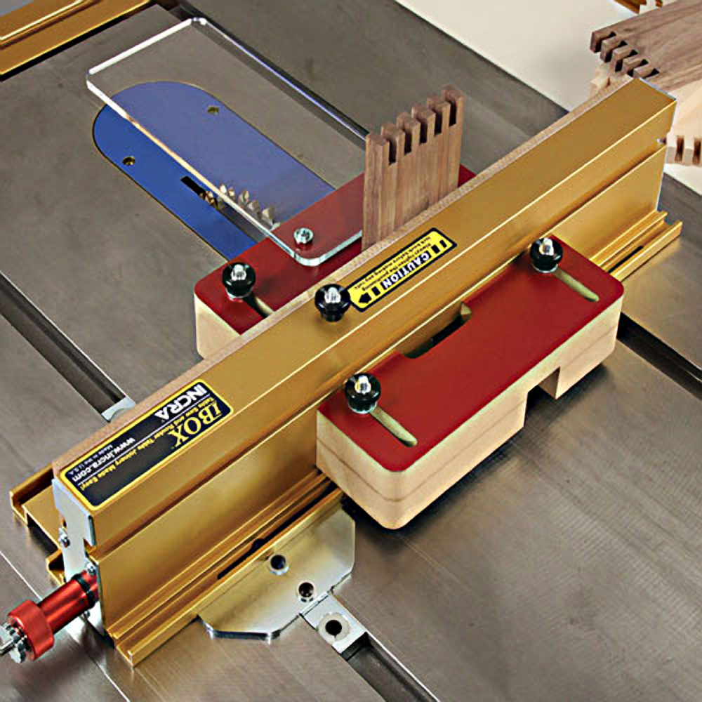 Precision jig tool with gold aluminum guide and red wooden clamps for woodworking in saw accessories collection