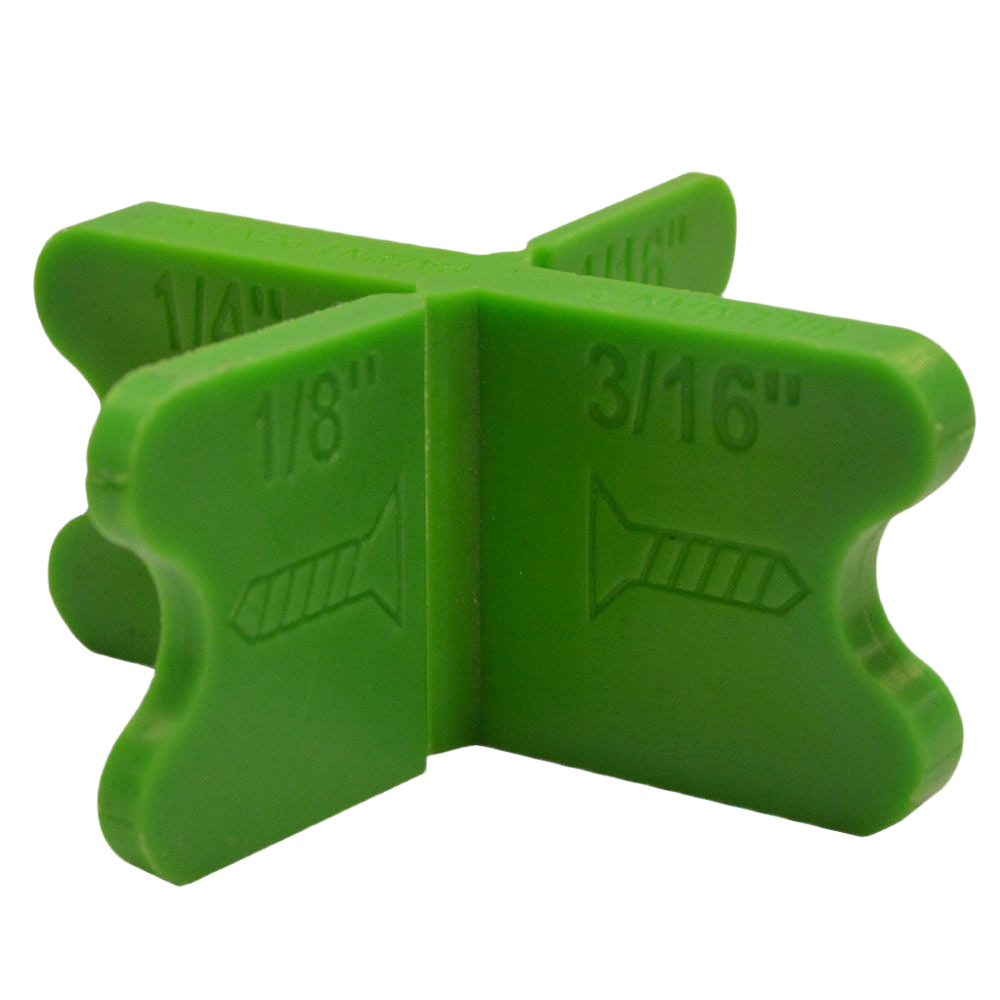 Green plastic deck board spacer with measurements for consistent gaps in wood and hardware projects