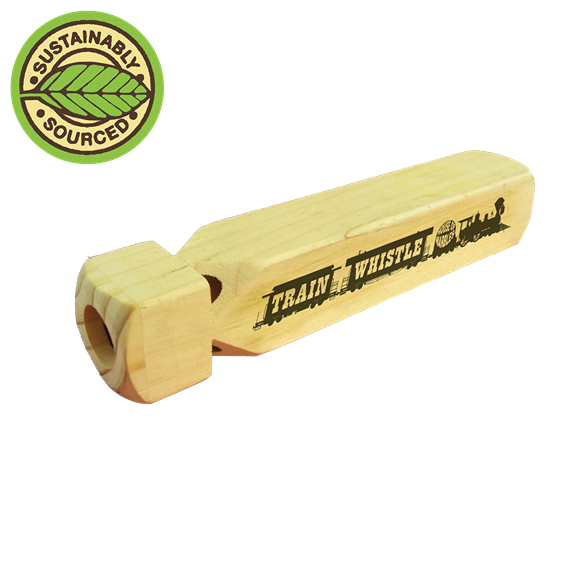 Light-colored wooden train whistle with engraved vintage train design and sustainably sourced leaf emblem nearby