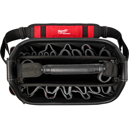 Top view of a red and black structured tote with multiple internal pockets for tool organization and jobsite storage
