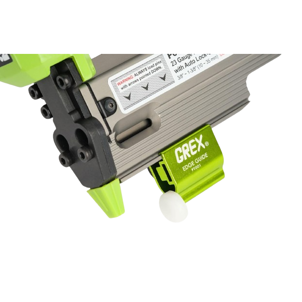 Close-up of a green and gray Grex edge guide attachment on a precision woodworking headless pinner tool