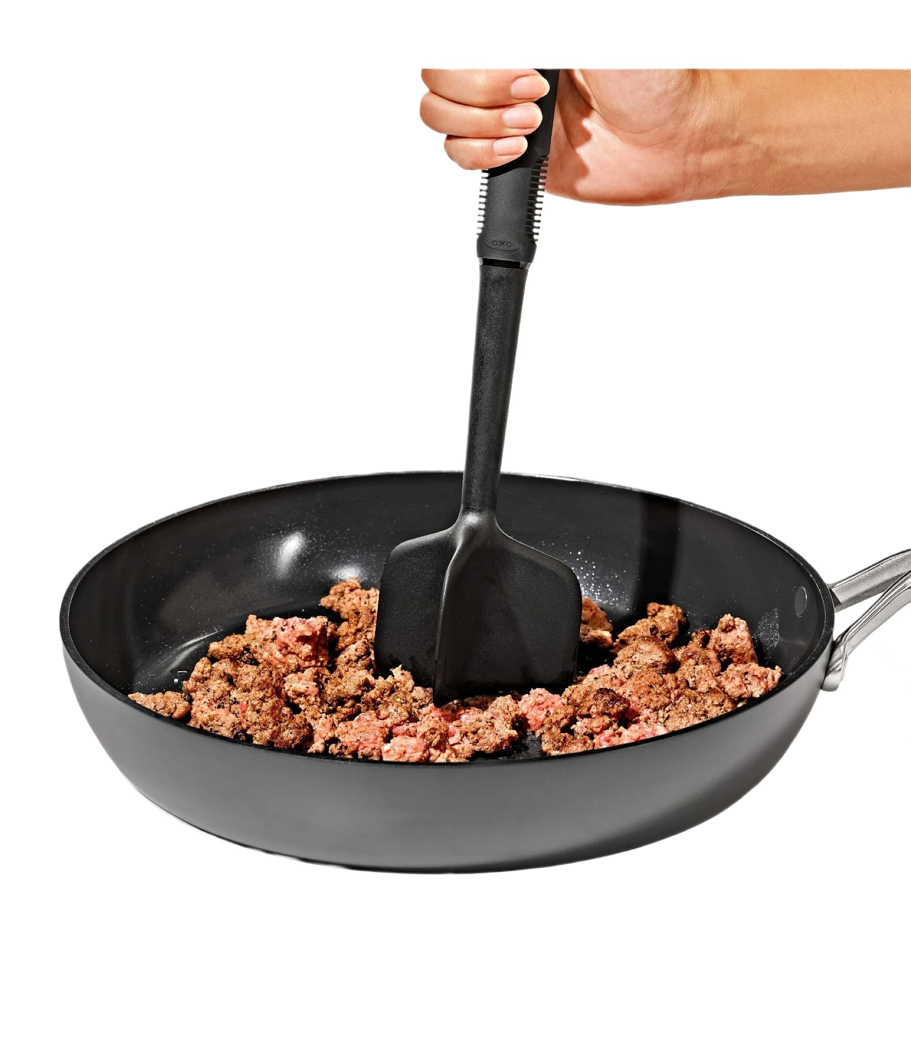 Black ground meat chopper with ergonomic handle breaking up cooked meat in non-stick skillet for kitchen utensils collections