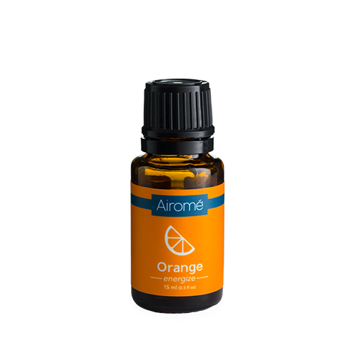 Amber glass bottle of orange essential oil with black ribbed cap and bright orange label for home scent use