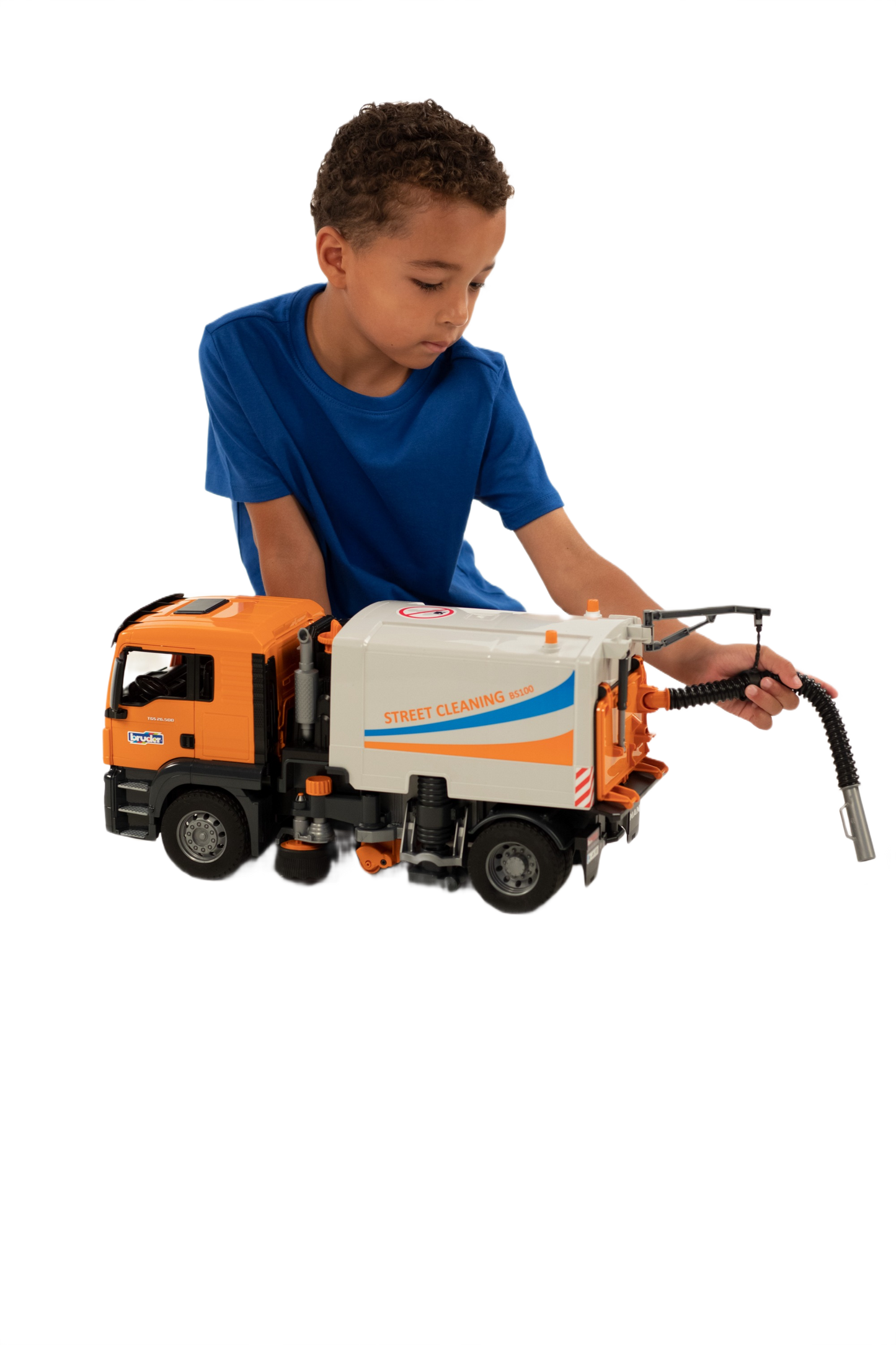 Child playing with orange and white street sweeper toy from Vehicles & Remote Controlled Toys and Bruder Toys collections