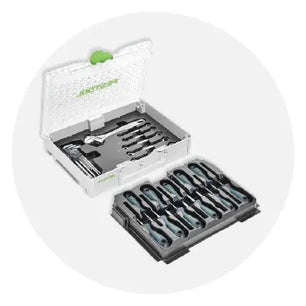 Open hard plastic case displaying a set of precision screwdrivers and small hand tools with black and green handles arranged inside a black tray.