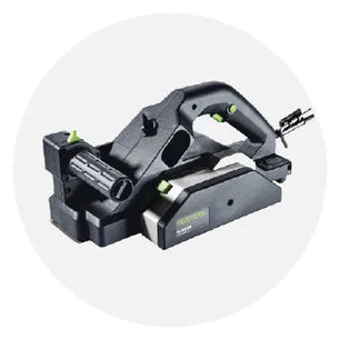 Black and green handheld electric planer with ergonomic handles and adjustable depth settings designed for woodworking and home improvement tasks.