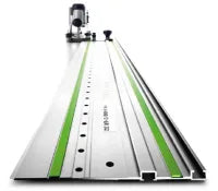 Aluminum guide rails with green anti-slip strips and a mounted track saw designed for precise cutting in home improvement tasks.
