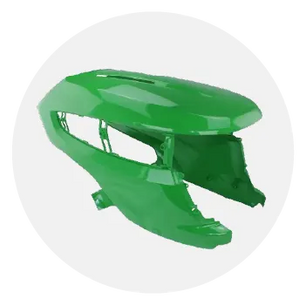 Glossy green plastic lawn mower hood with ventilation openings, designed to cover the engine area and enhance equipment appearance.