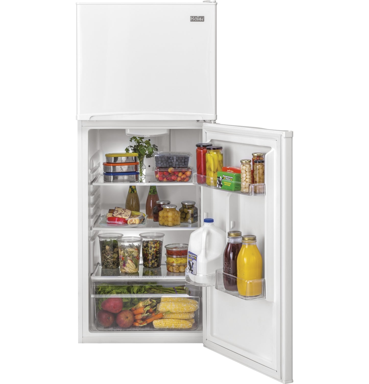 White top freezer refrigerator with open door showing organized shelves with assorted food and beverage items inside