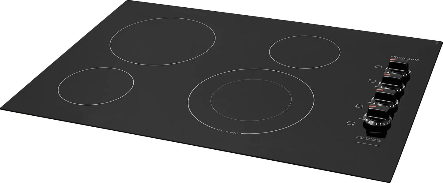 Frigidaire black electric cooktop with four varied-size burners and rotary controls for kitchen appliances collection