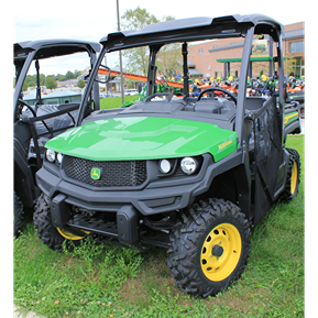 Green John Deere utility vehicle with rugged tires and full-size crossover design for outdoor and home improvement use