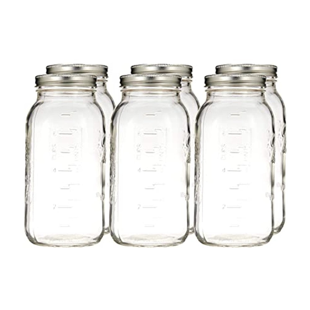 Six clear half-gallon wide mouth glass canning jars with metal lids for household storage and food preservation tasks