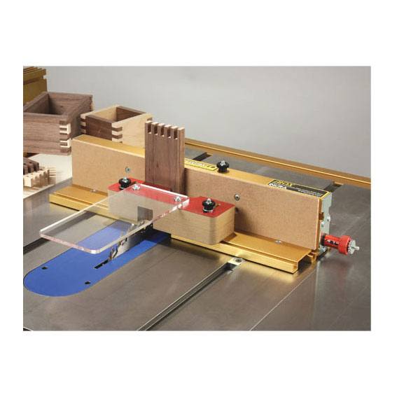 Woodworking jig with clear guard and red clamp for creating precise box and finger joints in tool accessories collection