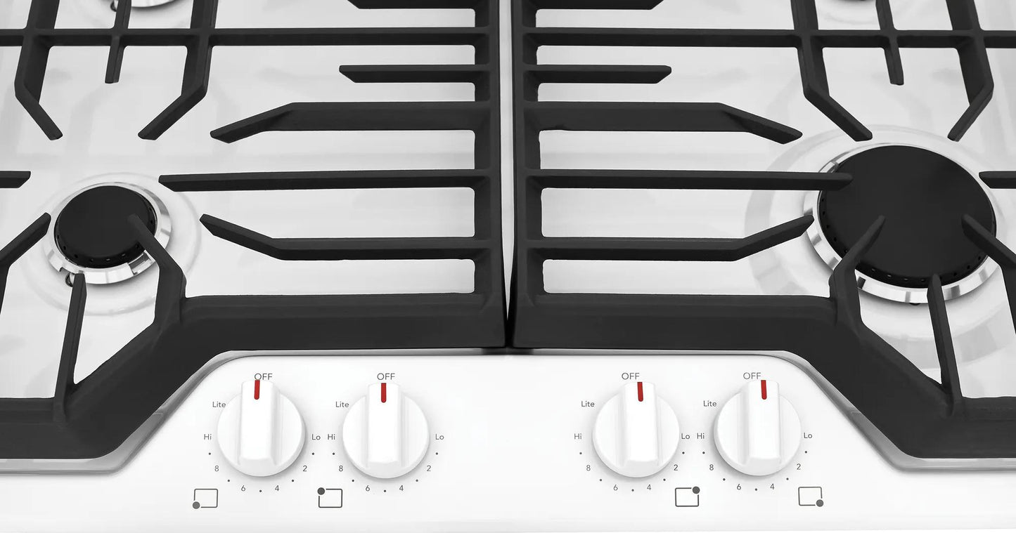 White gas cooktop with four burners, continuous edge-to-edge grates, and control knobs in cooktops and kitchenware collection