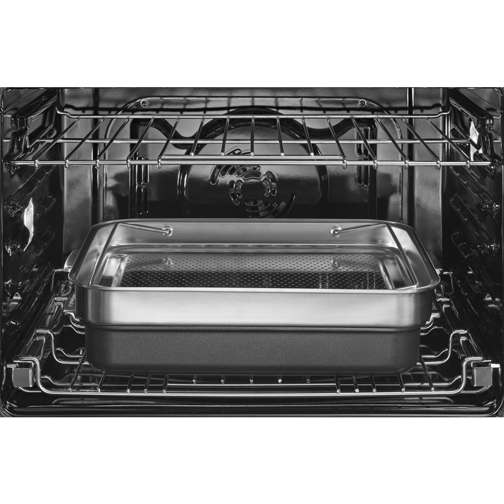 Interior view of single wall oven with removable stainless steel cooking insert from KitchenAid Appliances collection