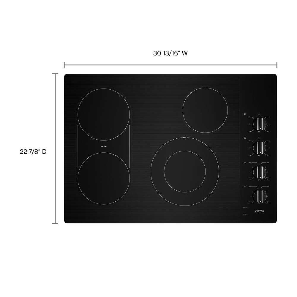 Black electric cooktop with four heating elements and four control knobs from cooktops and kitchenware collection